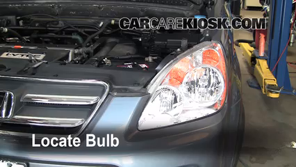 changing crv headlight bulb